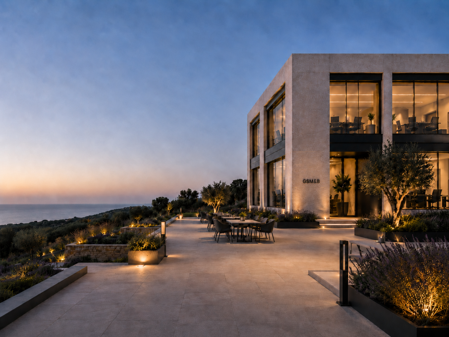 Atardecer sobre terraza moderna junto al mar
